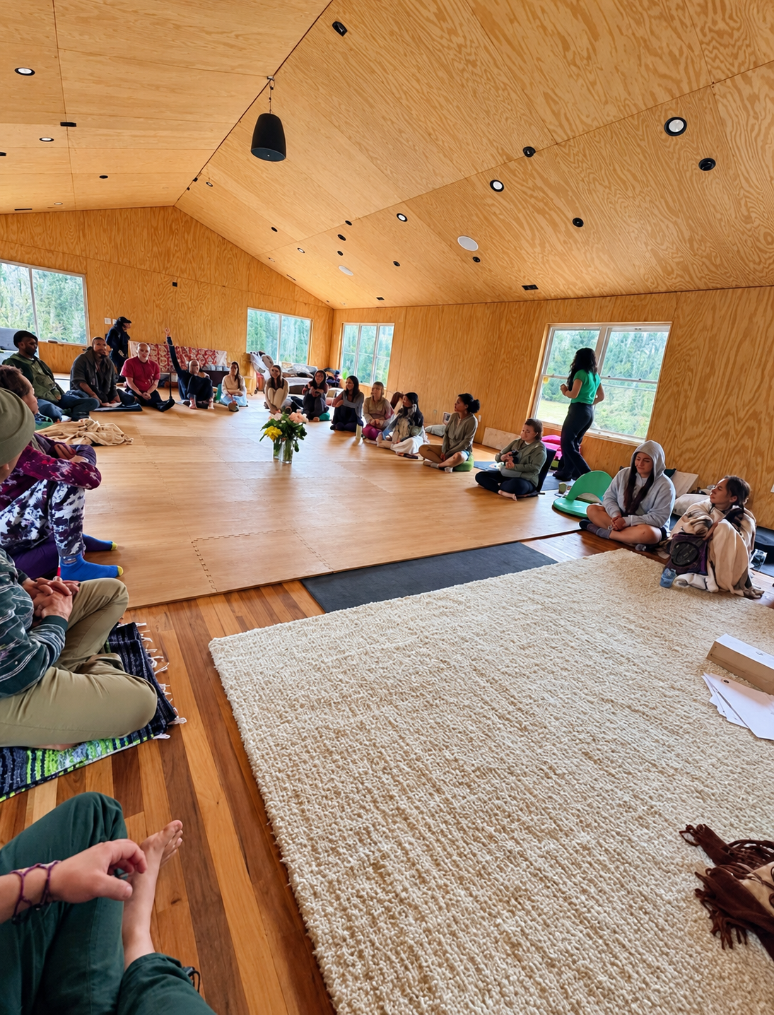 Participants gathering in a retreat circle
